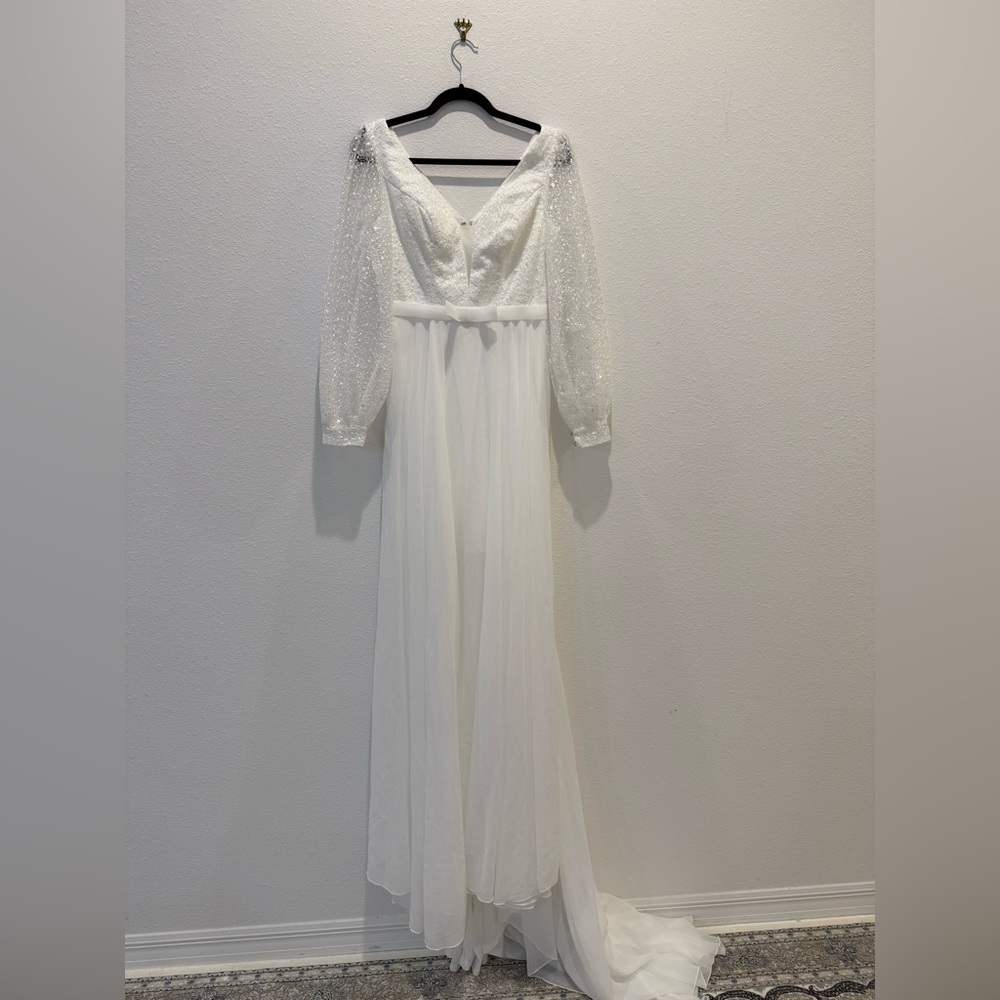 Elegant A-Line Wedding Dress with Sheer Sleeves & Flowing Train